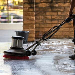 professional cleaning concrete with pressure washer